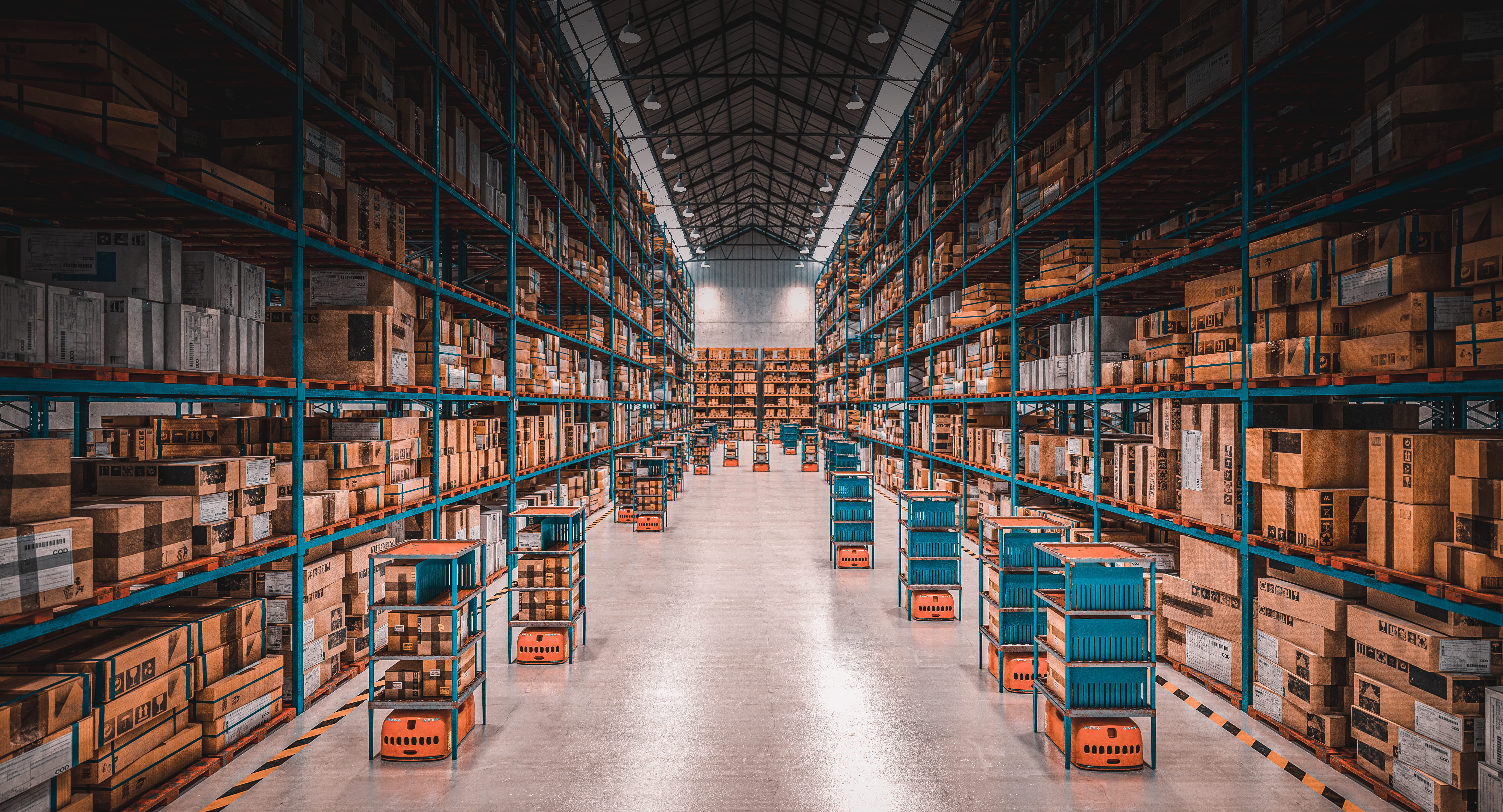 A spacious warehouse full of boxes piled on the shelves