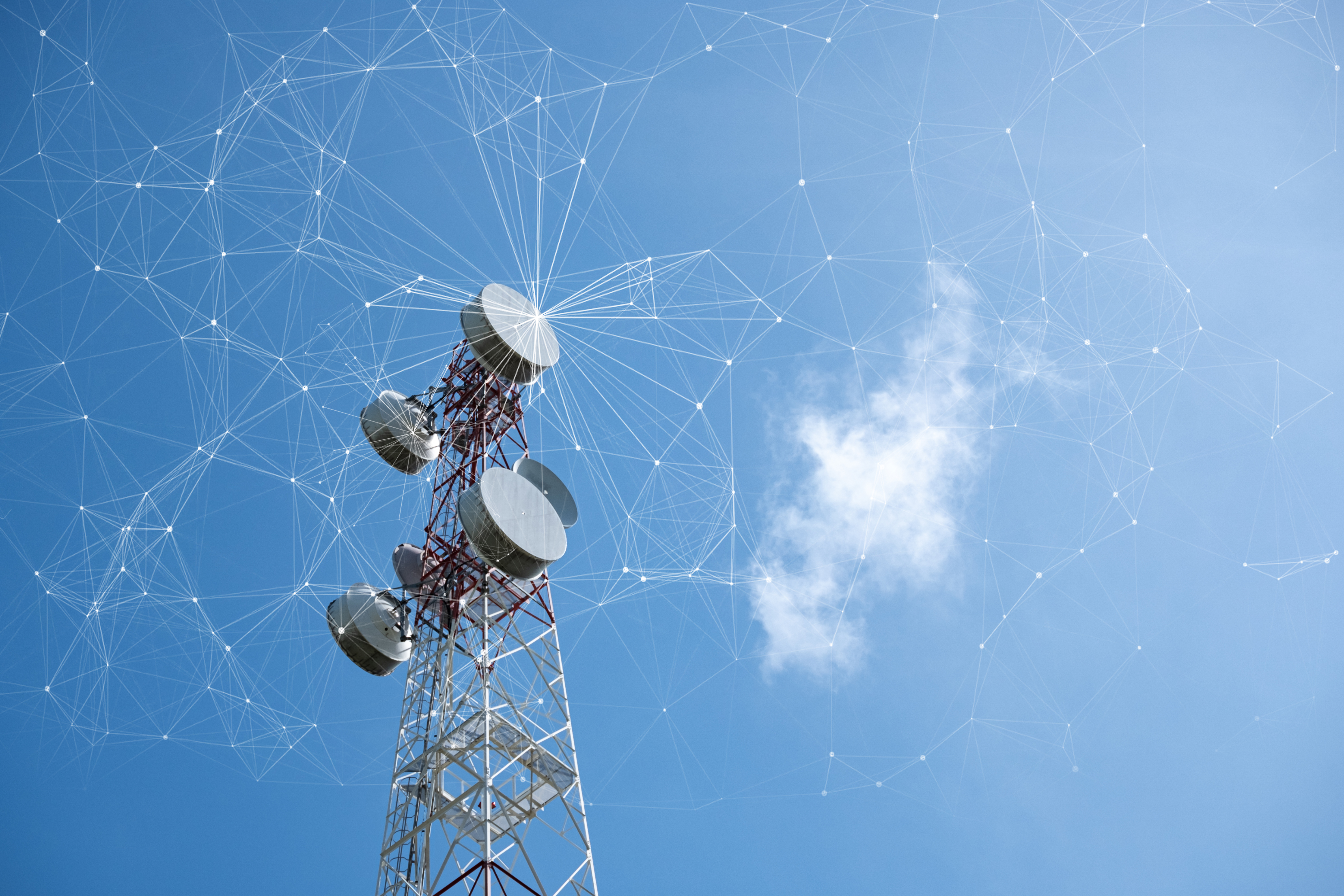 A tower under a blue clear sky with virtual wires in the sky
