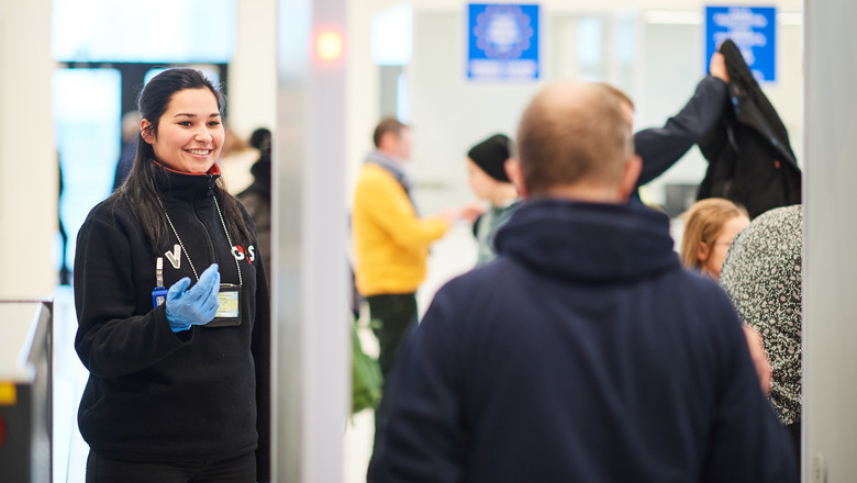 Female officer conducting security screening at Port Zeebrugge