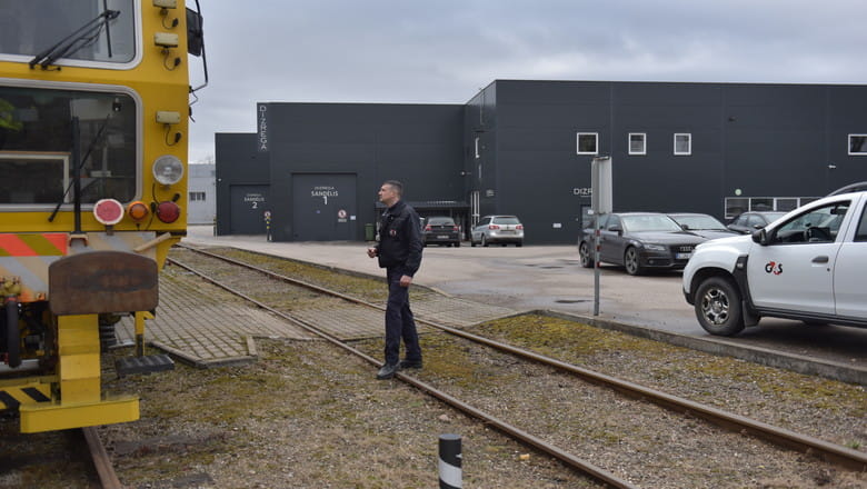Security officer at a secure factory in Lithuania
