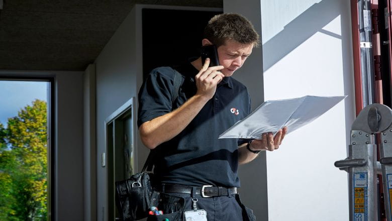G4S employee on the phone 