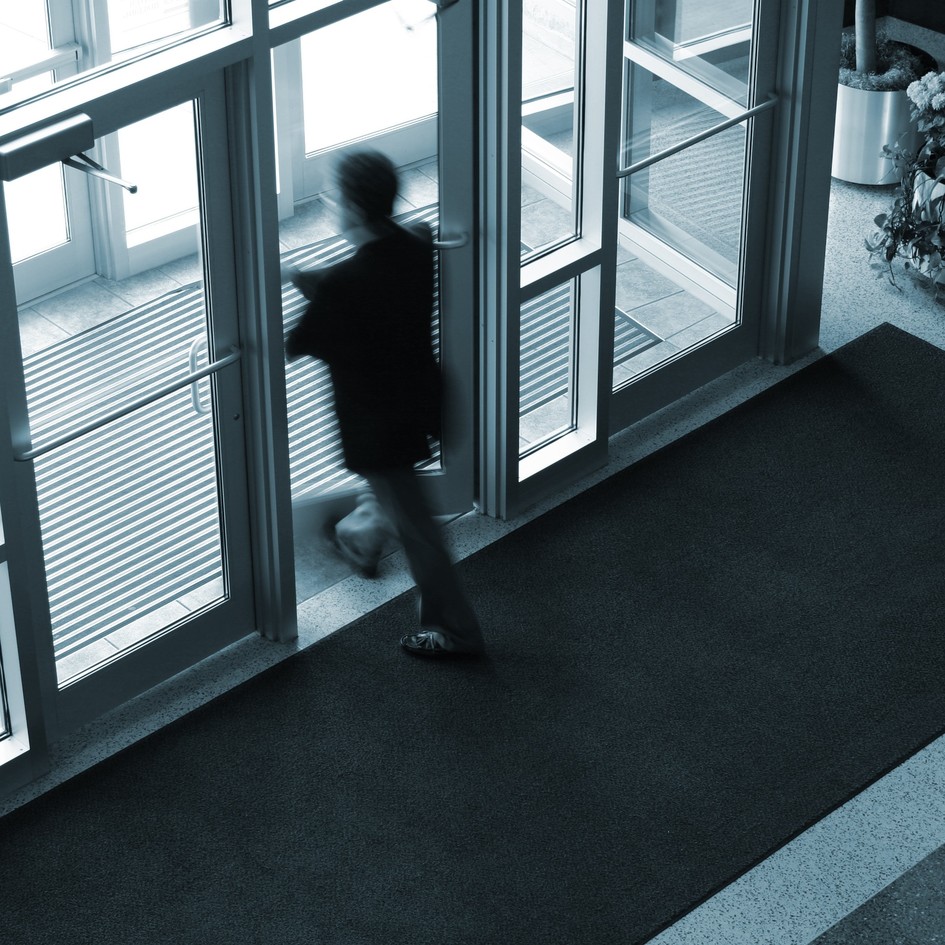 Man leaving a building