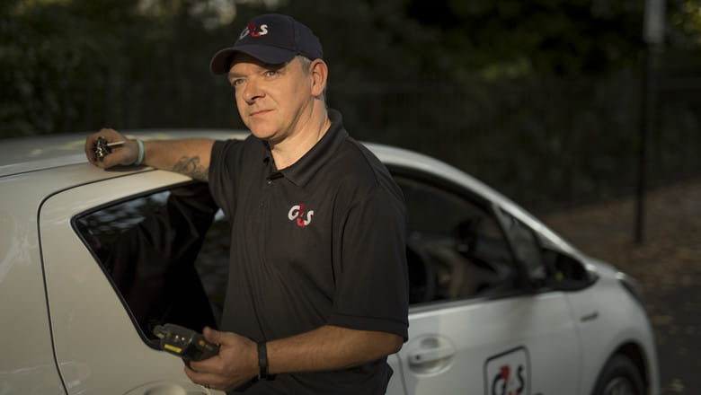 A G4S officer and a car