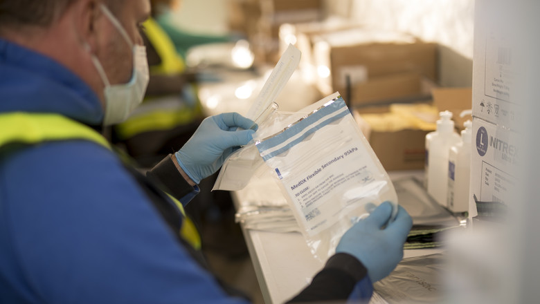 G4S staff preparing COVID-19 testing kits