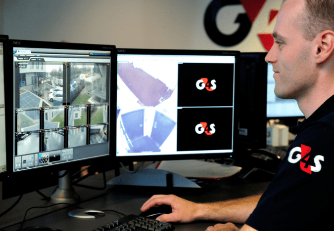 Youth Justice Security Professional looking at the monitor