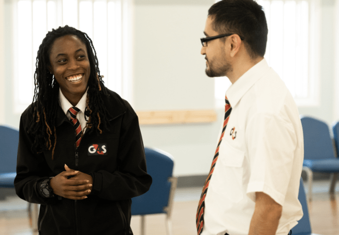 2 security professionals chatting