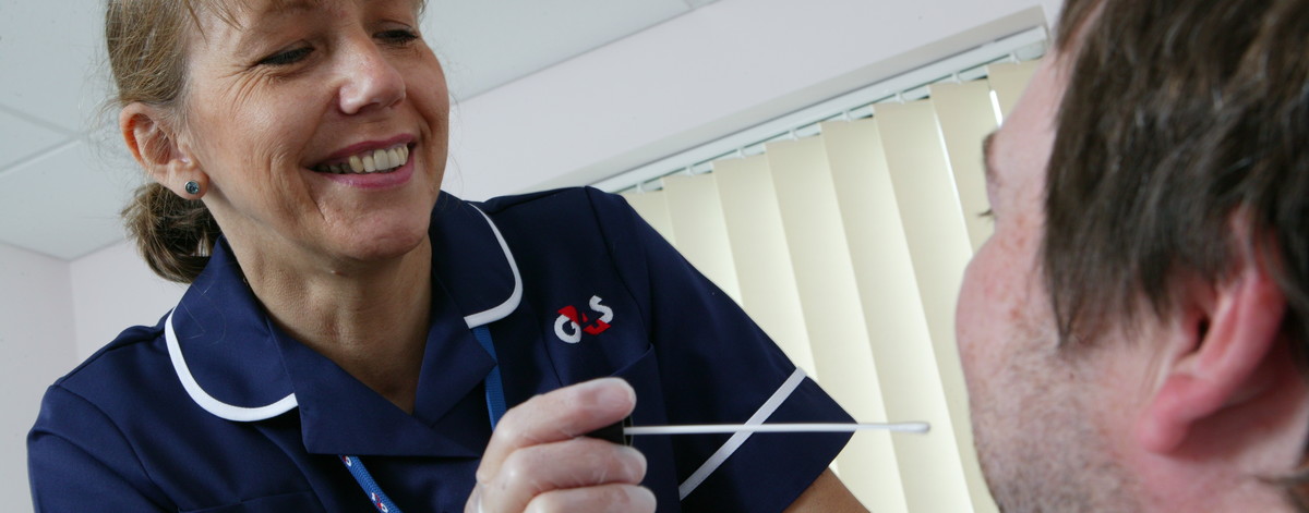 healthcare worker swabbing a client