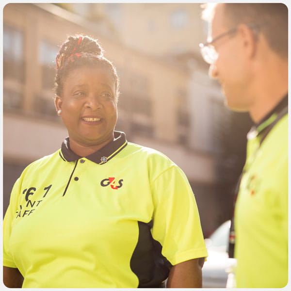 G4S employees in yellow shirts