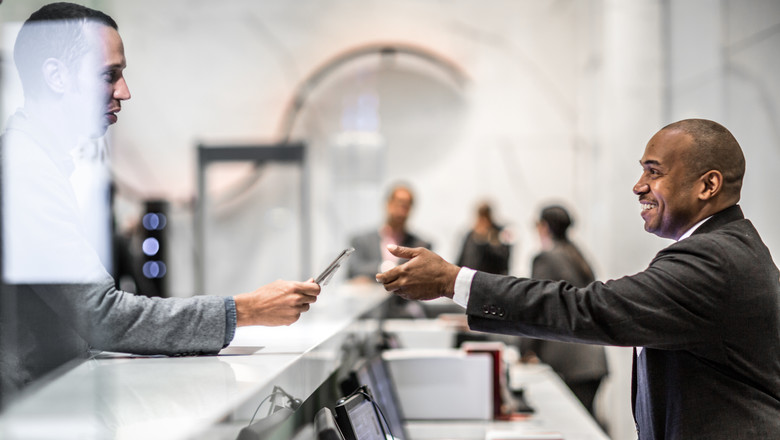 Security guard monitoring employee access control