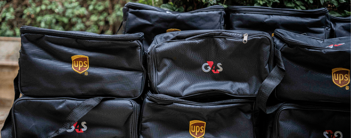 UPS and G4S logo on bags