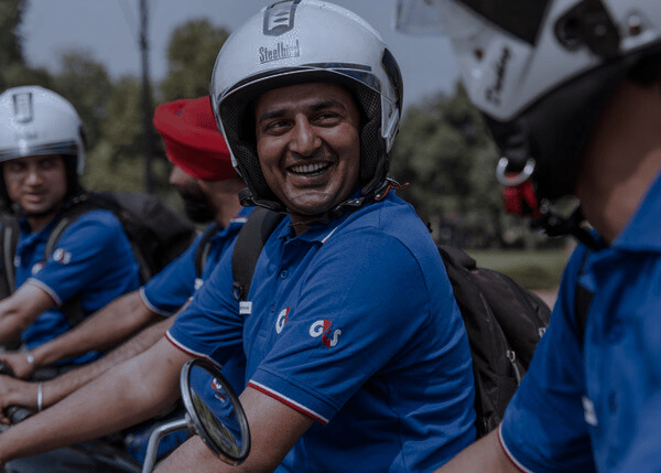 Motorcyclists wearing G4S uniform