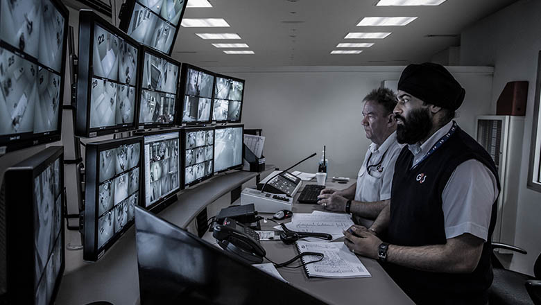 G4S staff monitoring security cameras