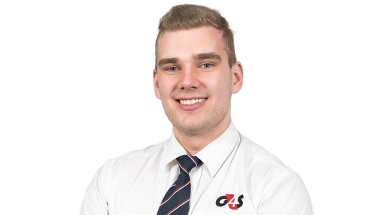 G4S male in white shirt uniform