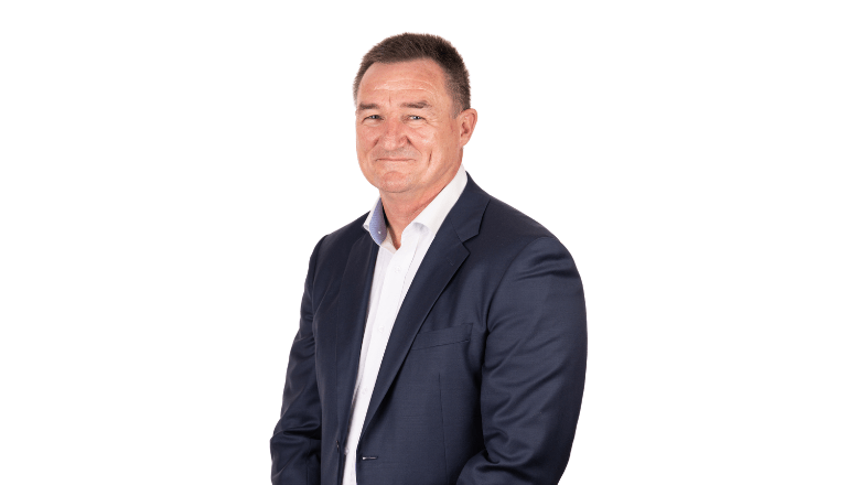 G4S Executive man wearing suit and tie in office