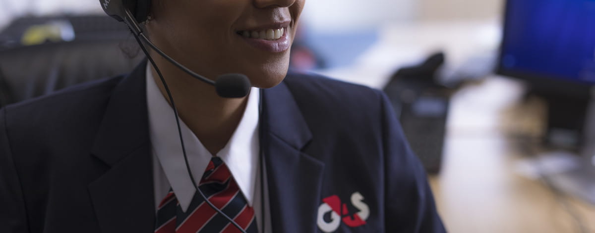 G4S staff member wearing headset