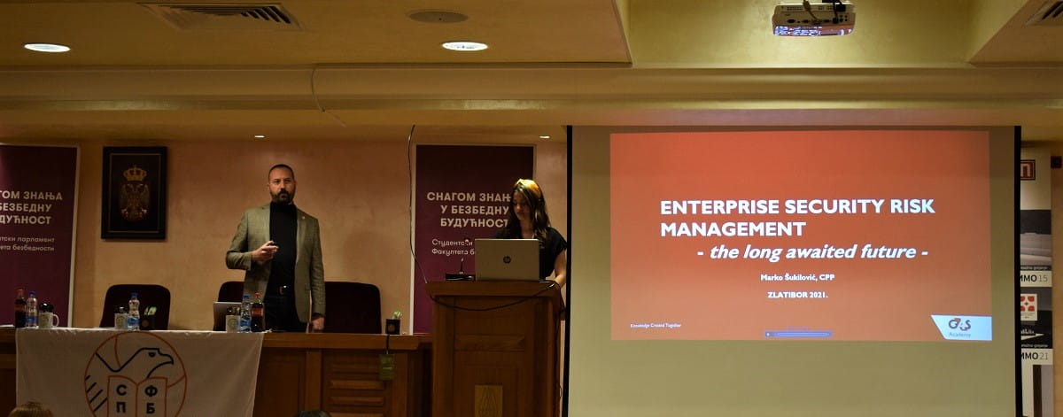 G4S employee Marko is presenting in the hall in front of the people in Zlatibor.