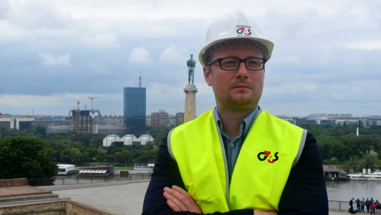 G4S employee wearing safety vest