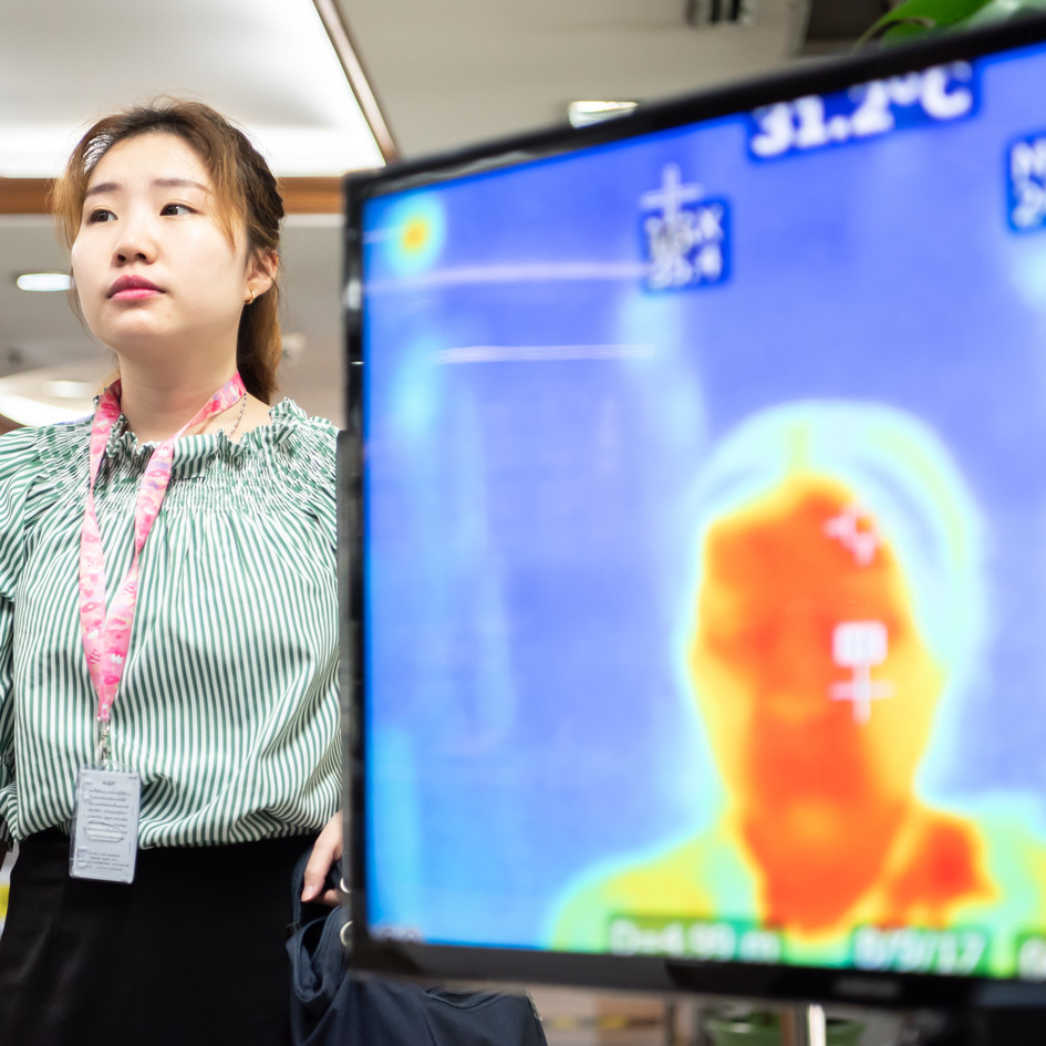 Thermal screening image and a woman