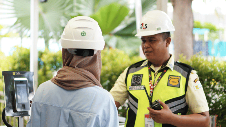 Security guard assisting an employee
