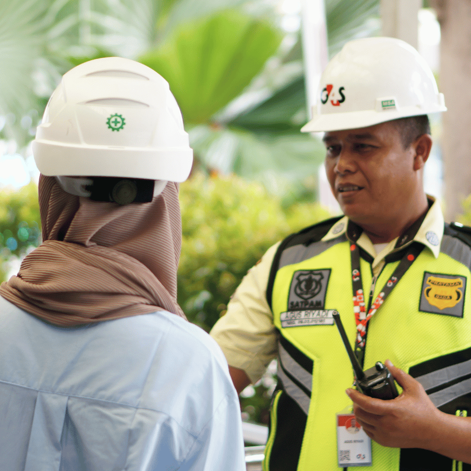 Security guard assisting an employee