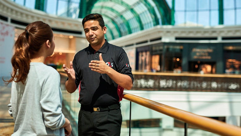 person guiding person