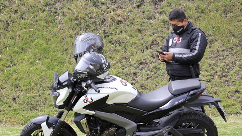 Security officer in Ecuador with a motorcycle