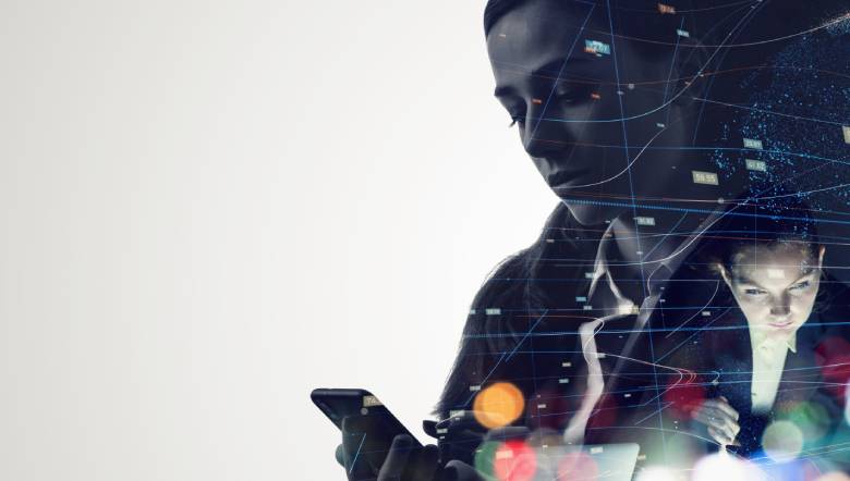 A person looking worried while looking at their mobile phone